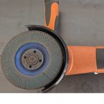Angle grinder with flap disk