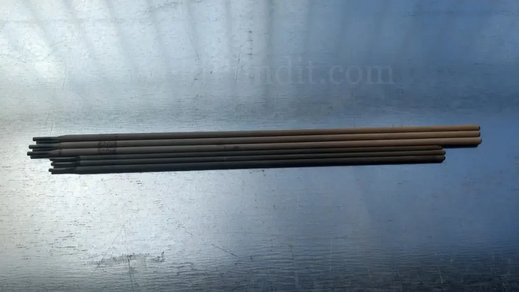 A photo of stick welding rods on galvanized steel